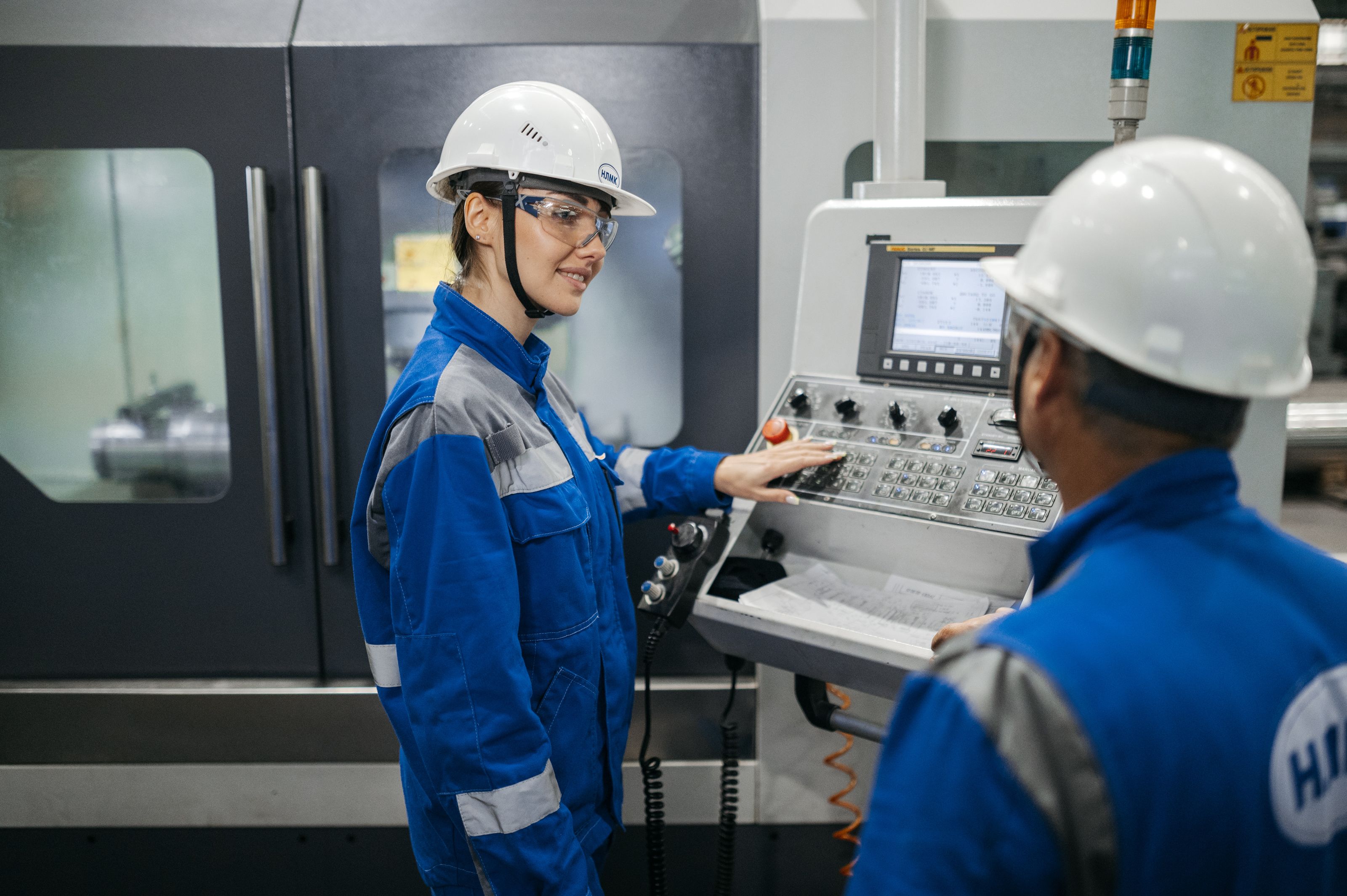 Maintenance crew servicing machinery